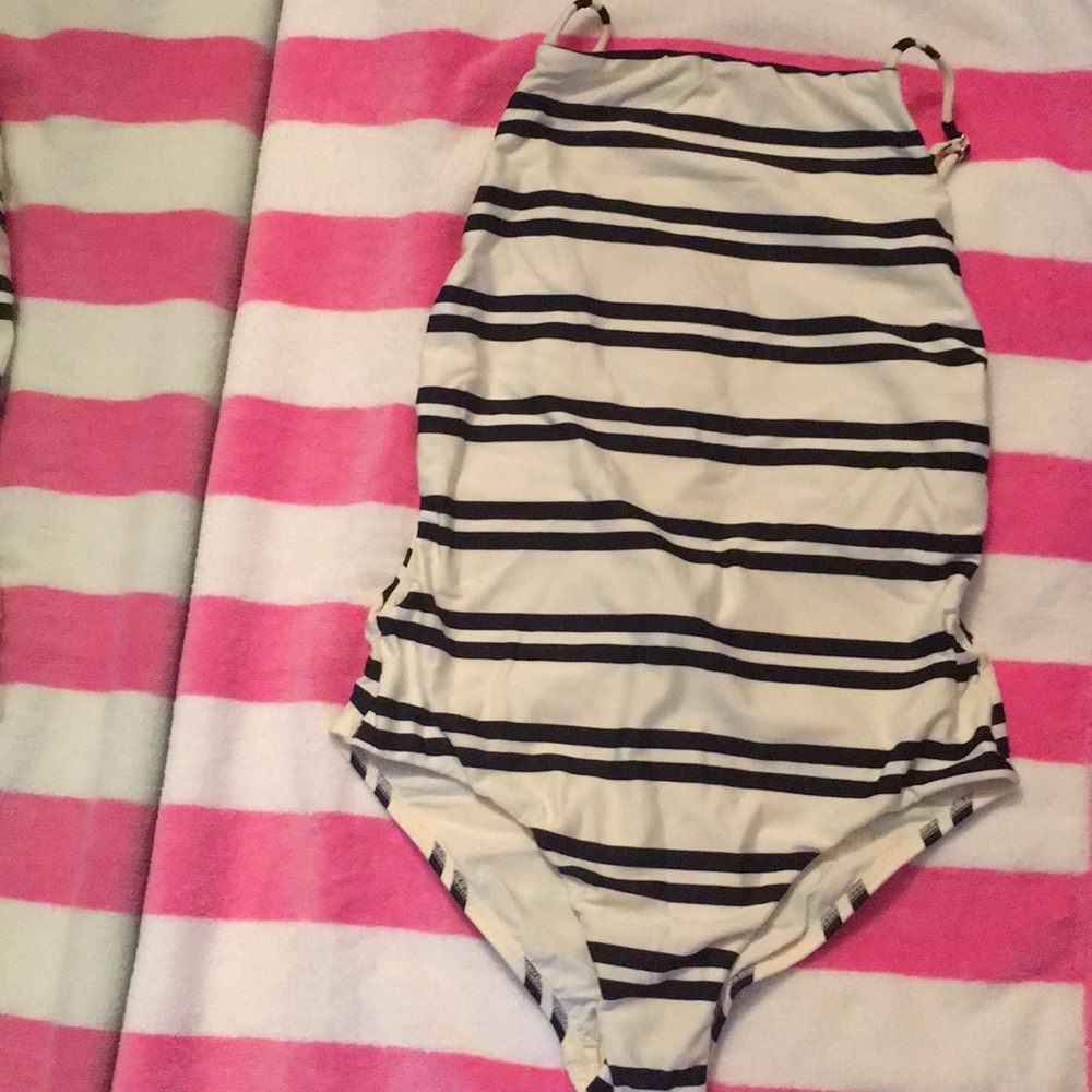 White swimsuit with black stripes